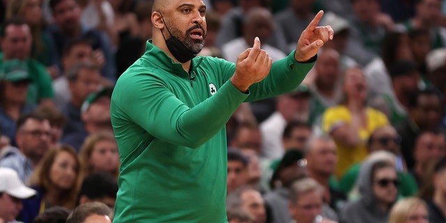 Head coach Ime Udoka of the Boston Celtics calls out a play in the fourth quarter against the Golden State Warriors during Game 3 of the NBA Finals at TD Garden in Boston on June 8, 2022.