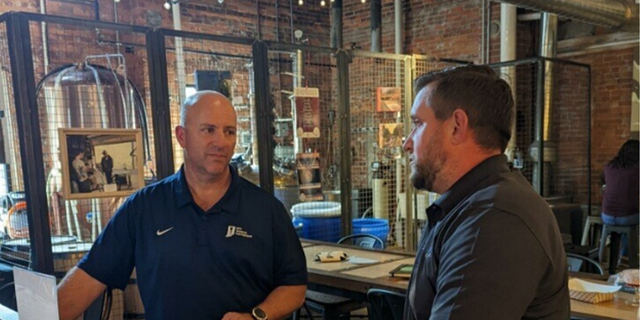 Matt Hall, left, is an Army combat veteran who serves as director of the Indy Warrior Partnership, which helps veterans in central Indiana.