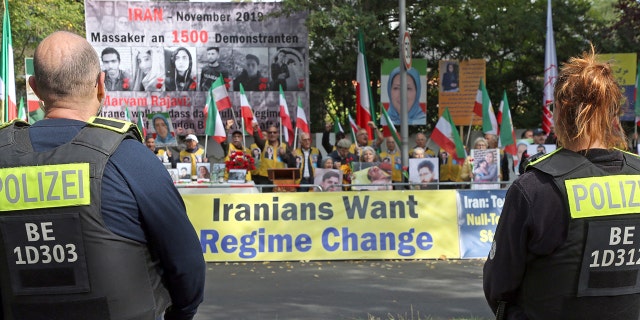 The people who followed the appeal of the German-Iranian Society in Berlin demonstrate in front of the Iranian embassy against the so-called "moral police" in their home country, in Berlin, Germany, on Friday, September 23, 2022. 