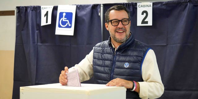 The League leader Matteo Salvini casts his ballot at a polling station in Milan, Italy, Sunday, Sept. 25, 2022. Italians are voting in a national election coming at a critical time for Europe. Soaring energy bills, largely caused by the war in Ukraine, have households and businesses fearful they can't keep the heat or lights on this winter. (AP Photo/Nicola Marfisi)