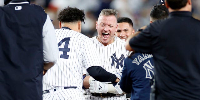 Josh Donaldson #28 of the New York Yankees reacts after hitting a walk-off hit in the 10th inning against the Boston Red Sox on September 22, 2022 at Yankee Stadium in the Bronx, New York City. The Yankees won 5-4.