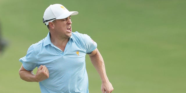 Justin Thomas of the United States Team reacts on the 15th green during the Thursday foursome matches on day one of the 2022 Presidents Cup at Quail Hollow Country Club on September 22, 2022 in Charlotte, North Carolina.