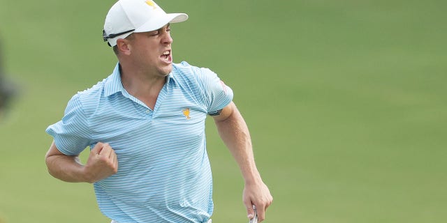Justin Thomas of the United States Team reacts on the 15th green during the Thursday foursome matches on day one of the 2022 Presidents Cup at Quail Hollow Country Club on September 22, 2022 in Charlotte, North Carolina.