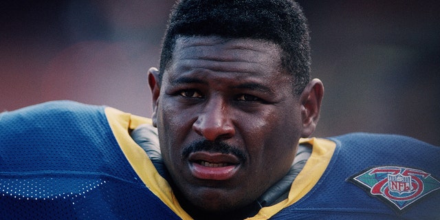 An exhausted NFL Pro Hall Fame offensive tackle Jackie Slater is seen in Anaheim, California, against the Washington Redskins in 1994.