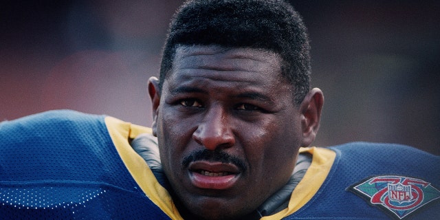 An exhausted NFL Pro Hall Fame offensive tackle Jackie Slater is seen in Anaheim, California, against the Washington Redskins in 1994.