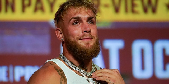 Jake Paul speaks during a news conference Monday, Sept.  12, 2022, in Los Angeles.  He is scheduled to fight Anderson Silva at a catchweight of 187 pounds on Oct.  29 in Phoenix.