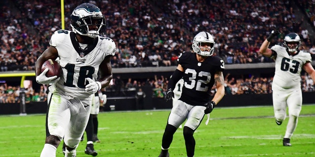 Philadelphia Eagles wide receiver Jalen Reagor scores a touchdown against the Las Vegas Raiders at Allegiant Stadium on Oct. 24, 2021, in Paradise, Nevada.