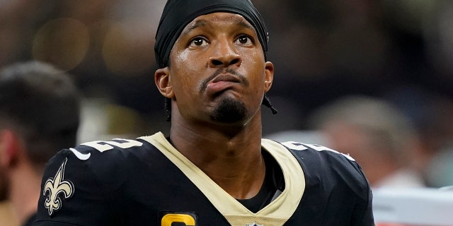 New Orleans Saints quarterback Jameis Winston watches during the second half against the Tampa Bay Buccaneers in New Orleans on Sept. 18, 2022.