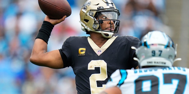 New Orleans Saints quarterback Jameis Winston (2) sets back to pass the ball during the first half of an NFL football game against the Carolina Panthers, Sunday, Sept. 25, 2022, in Charlotte, N.C. 