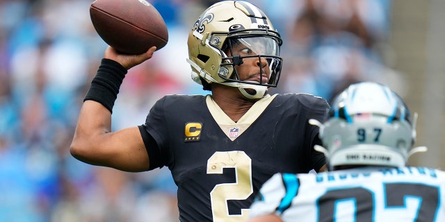 New Orleans Saints quarterback Jameis Winston (2) sets back to pass the ball during the first half of an NFL football game against the Carolina Panthers, Sunday, Sept. 25, 2022, in Charlotte, N.C.