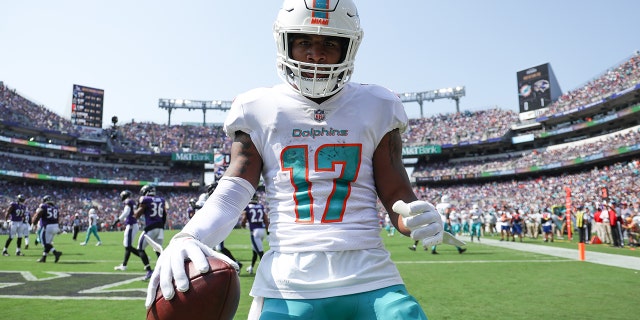 Wide receiver Jaylen Waddle, #17 of the Miami Dolphins, celebrates after catching a first half touchdown pass against the Baltimore Ravens at M&T Bank Stadium on Sept. 18, 2022 in Baltimore.