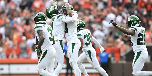 Sauce Gardner (1) and Ashtyn Davis (21) of the New York Jets celebrate after their 30-31 win over the Cleveland Browns at FirstEnergy Stadium Sept. 18, 2022, in Cleveland. 