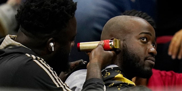 US Open 2022: YouTube star removed from grounds after haircut prank 2 A fan gets a haircut as Nick Kyrgios, of Australia, plays Karen Khachanov, of Russia, during the quarterfinals of the U.S. Open tennis championships, Tuesday, Sept. 6, 2022, in New York.