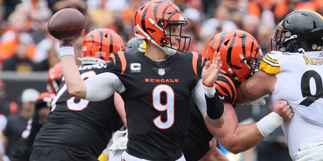 Quarterback Joe Burrow of the Bengals attempts a pass against the Pittsburgh Steelers at Paul Brown Stadium on Sept. 11, 2022, in Cincinnati.