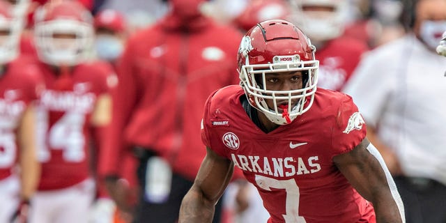 Joe Foucha, #7 of the Arkansas Razorbacks, plays defense during a game against the LSU Tigers at Razorback Stadium on November 21, 2020 in Fayetteville, Arkansas.  The Tigers defeated the Razorbacks 27-24. 