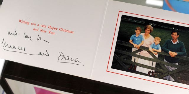 Prince Charles and Princess Diana Christmas card is seen during the preview day of the "Icons and Idols" and "property from the life and career of Johnny Cash" auctions at Julien's Auctions in Beverly Hills, California on Nov. 19, 2010.