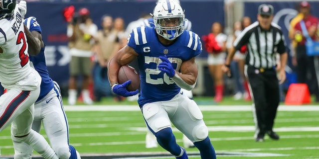 Indianapolis Colts running back Jonathan Taylor (28) carries the ball in the first quarter against the Houston Texans Sept. 11, 2022, at NRG Stadium in Houston.