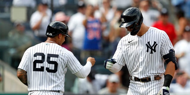 New York Yankees' Aaron Judge, right, celebrates with Gleyber Torres after hitting a home run against the Minnesota Twins during the sixth inning at Yankee Stadium in New York on Sept. 5, 2022.