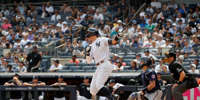 Aaron Judge of the New York Yankees doubles in the first inning against the Minnesota Twins at Yankee Stadium in New York on Sept. 5, 2022.