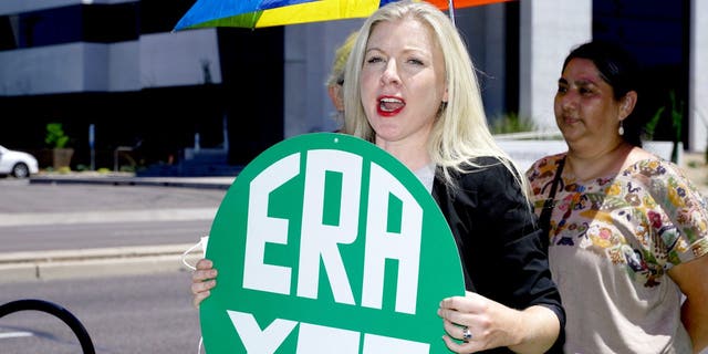 PHOENIX, ARIZONA - AUGUST 02: Activist Lawyer Julie Gunnigle attends the Women's March Foundation and Feminist Majority delivering 15,000 letters, postcards, and printed emails to Senator Kyrsten Sinema on August 02, 2021 in Phoenix, Arizona. 