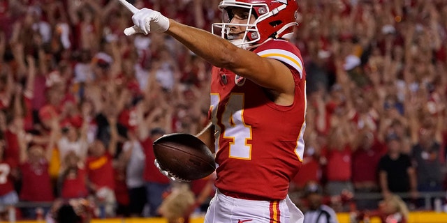 Kansas City Chiefs wide receiver Justin Watson scores in the second half of an NFL football game against the Los Angeles Chargers on Thursday, Sept. 15, 2022 in Kansas City, Missouri.