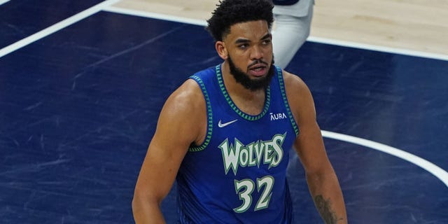 Karl-Anthony Towns #32 of the Minnesota Timberwolves looks on during the game against the Memphis Grizzlies during Round 1 Game 6 of the 2022 NBA Playoffs on April 29, 2022 at Target Center in Minneapolis, Minnesota.