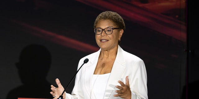 Rep. Karen Bass speaks as developer Rick Caruso, not pictured, listens, during the Los Angeles mayoral debate at the Skirball Cultural Center in Los Angeles, Wednesday, Sept. 21, 2022. 