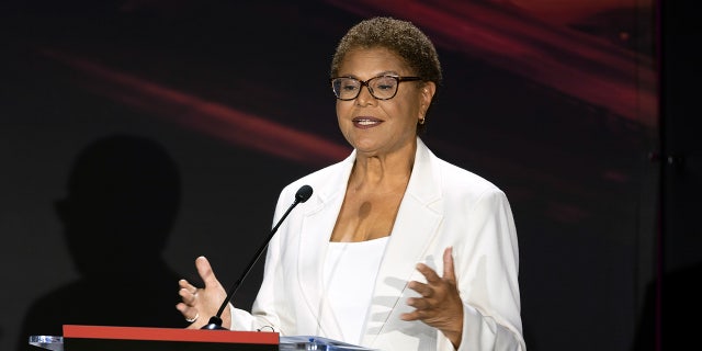 Rep. Karen Bass speaks as developer Rick Caruso, not pictured, listens, during the Los Angeles mayoral debate at the Skirball Cultural Center in Los Angeles, Wednesday, Sept. 21, 2022. 