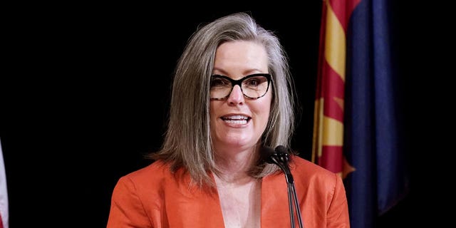 Arizona Secretary of State Katie Hobbs addresses the members of Arizona's Electoral College prior to them casting their votes in Phoenix on Dec. 14, 2020.