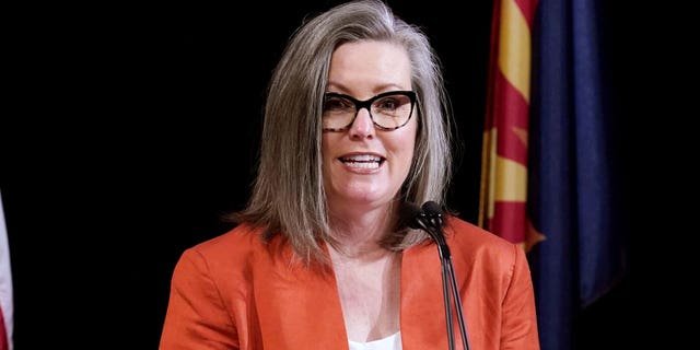 Arizona Secretary of State Katie Hobbs addresses the members of Arizona's Electoral College prior to them casting their votes in Phoenix on Dec. 14, 2020.