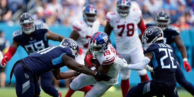 New York Giants wide receiver Kenny Golladay (19) makes a catch against the Tennessee Titans defense during the first half of a game Sept. 11, 2022, in Nashville.