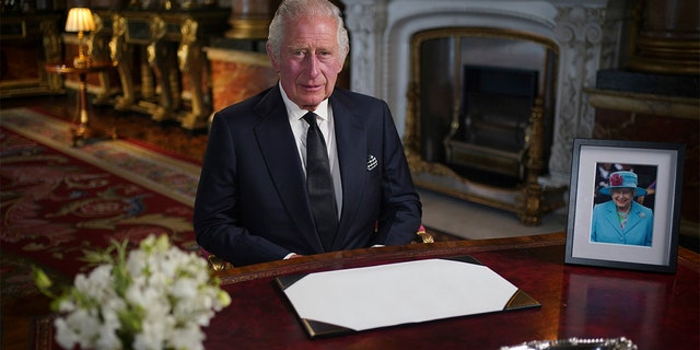 Britain's King Charles III delivers his address to the nation and the Commonwealth from Buckingham Palace, London, Friday, Sept. 9, 2022, following the death of Queen Elizabeth II on Thursday. 