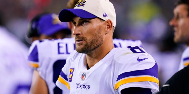 Minnesota Vikings quarterback Kirk Cousins, 8, watches from the sidelines during the second half of an NFL football game against the Philadelphia Eagles in Philadelphia, Monday, Sept. 19, 2022.