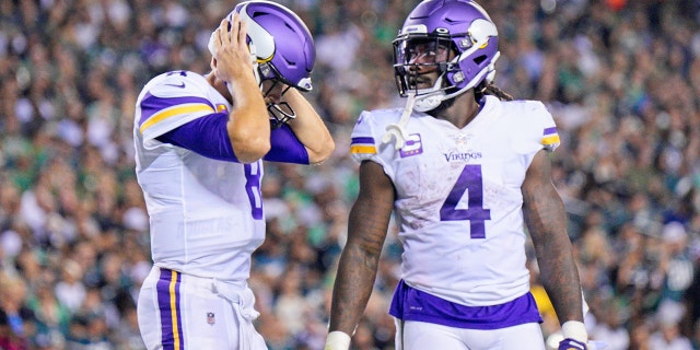 Minnesota Vikings quarterback Kirk Cousins, #8, holds his head during game between the Vikings and the Philadelphia Eagles on Sept. 19, 2022 at Lincoln Financial Field in Philadelphia.