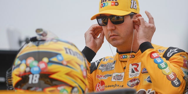 Kyle Busch, #18 M&M's Toyota driver, prepares to practice for the NASCAR Cup Series Hollywood Casino 400 at Kansas Speedway on September 10, 2022 in Kansas City, Kansas. 