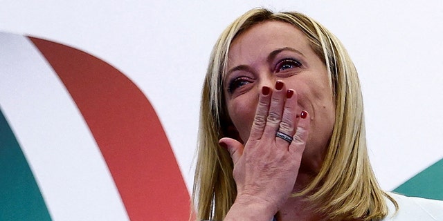 Leader of Brothers of Italy Giorgia Meloni reacts at the party's election night headquarters, in Rome, Italy.