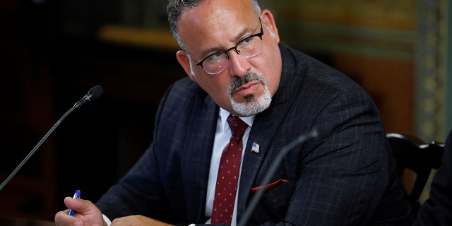 U.S. Secretary of Education Miguel Cardona meets leaders from U.S. colleges and universities to discuss challenges students are facing after the Supreme Court decision to end the nationwide constitutional right to abortion, in the Vice President's ceremonial office at the Eisenhower Executive Office Building in Washington, U.S., August 8, 2022. 