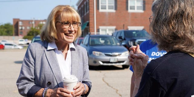 Democratic Sen. Maggie Hassan of New Hampshire, who is running for re-election, speaks with supporters at a campaign event on Sept. 12, 2022 in Dover, New Hampshire. 