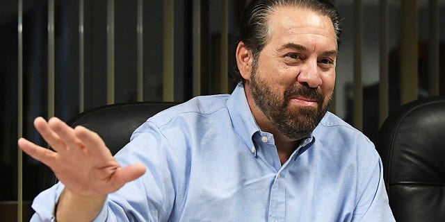 Arizona Attorney General Mark Brnovich gestures and smiles during his visit to the Yuma Sun in Yuma, Ariz., Thursday morning, June 2, 2022. A new Arizona law banning abortions after 15 weeks of pregnancy takes effect Saturday, Sept. 24, 2022 as a judge weighs a request to allow a pre-statehood law that outlaws nearly all abortions to be enforced. 