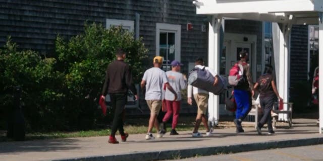 Illegal immigrants arrive at Martha's Vineyard Airport in Massachusetts on Sept. 14, 2022.