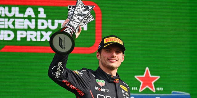 Race winner Max Verstappen celebrates on the podium during the F1 Grand Prix of The Netherlands at Circuit Zandvoort on Sept. 4, 2022.