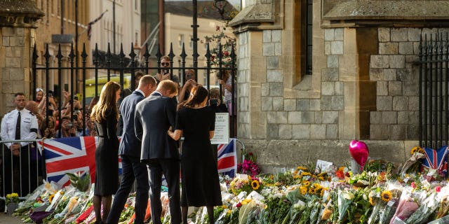 Kate Middleton, Prince William, Prince Harry and Meghan Markle pictured outside Windsor Castle Saturday.