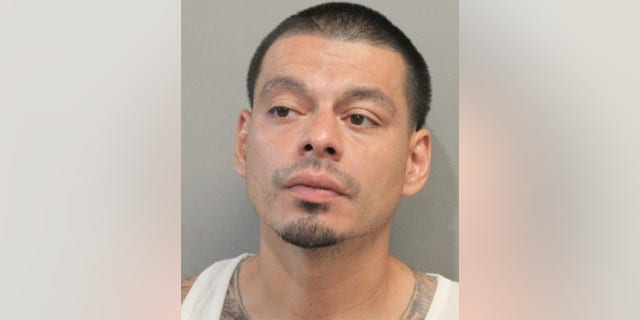 A mugshot of Miguel Quintana.