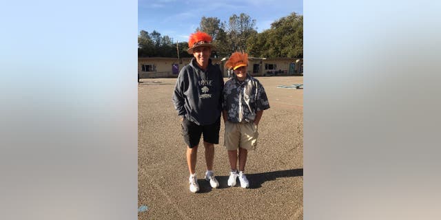 At Ione Elementary School, Mike Huss taught fifth grade. Here he is with his former student, Aubrey Gold (right), who dressed up like Huss for Halloween.