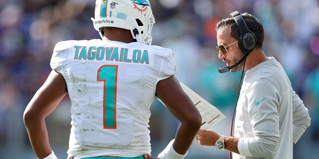 Miami Dolphins head coach Mike McDaniel talks to Tua Tagovailoa during a game against the Baltimore Ravens at M and T Bank Stadium Sept. 18, 2022, in Baltimore, Md.