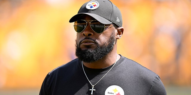 Pittsburgh Steelers head coach Mike Tomlin watches warm-ups before a game against the New England Patriots at Acrisure Stadium on Sept. 18, 2022 in Pittsburgh.