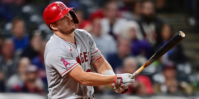 Los Angeles Angels' Mike Trout reacts after flying out during the eighth inning of the team's baseball game against the Cleveland Guardians, Tuesday, Sept. 13, 2022, in Cleveland.