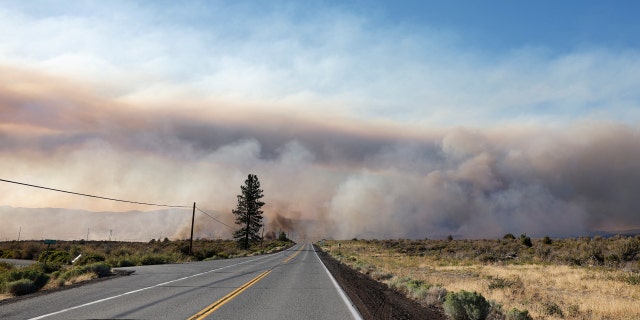 Smoke billows as the Mill Fire burns near Weed, California, U.S., September 2, 2022.