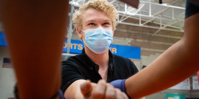 Nathan Brookes, of Agoura, gets his second shot of monkeypox vaccine at the Balboa Sports Complex vaccine site in Los Angeles on Thursday, Sept. 8, 2022. 