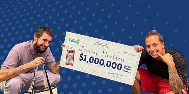 Jeremy Hartzell, 25, poses with his brother after winning the $1 million lottery prize on a $10 scratch-off ticket.